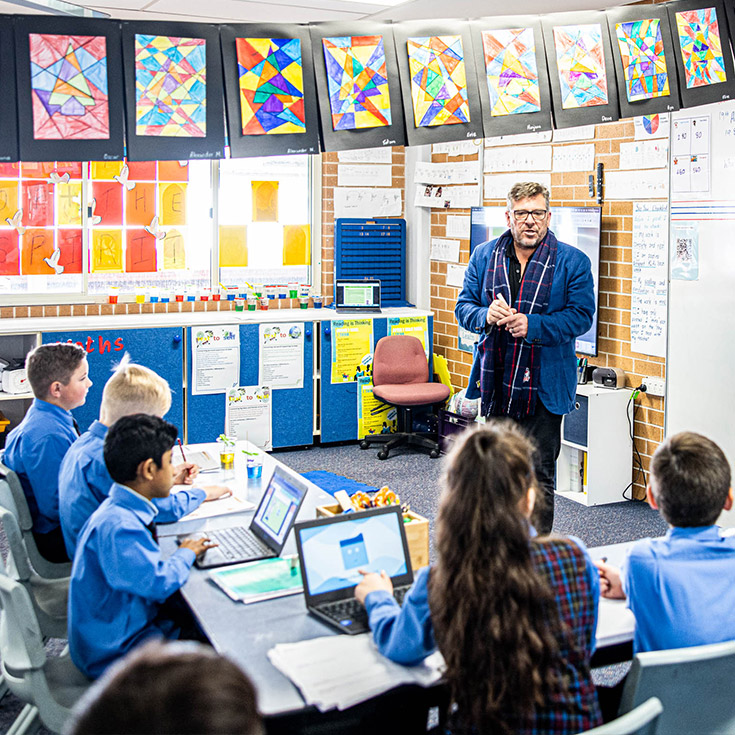 Teacher with class at Our Lady of Lourdes Seven Hills